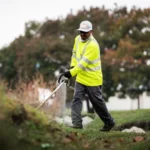 Black Hill Landscaping crew performing commercial lawn maintenance in Fort Worth 