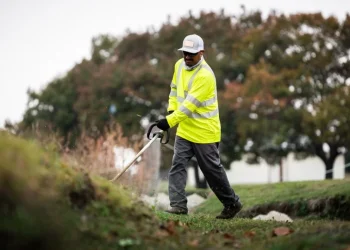 Black Hill Landscaping crew performing commercial lawn maintenance in Fort Worth